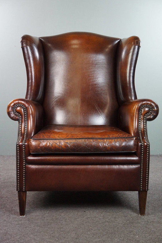 Image 1 of Large sheep leather ear armchair