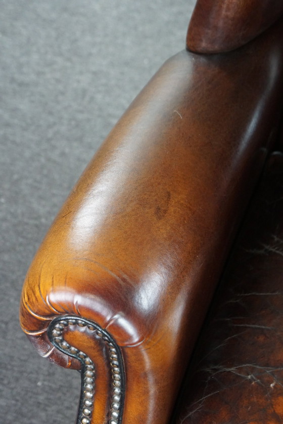 Image 1 of Large sheep leather ear armchair