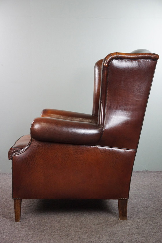 Image 1 of Large sheep leather ear armchair