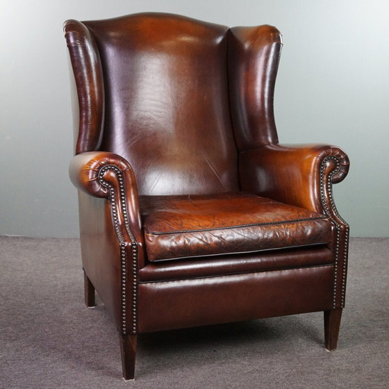 Image 1 of Grand fauteuil à oreilles en cuir de mouton