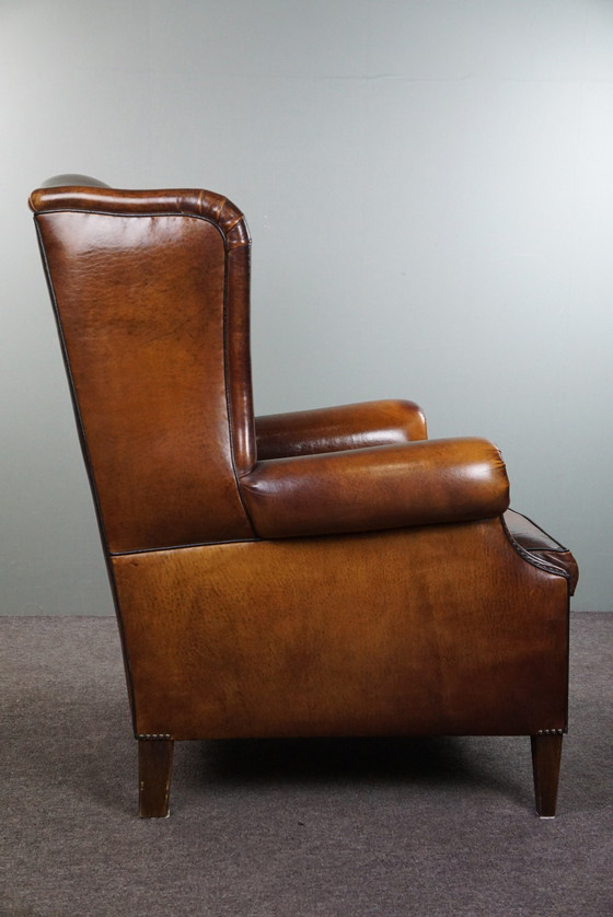 Image 1 of Large sheep leather ear armchair