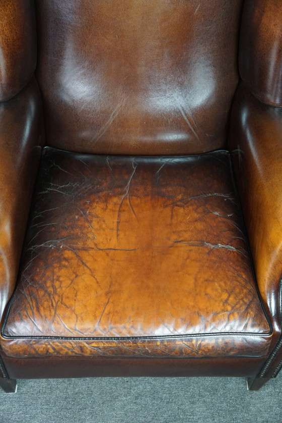 Image 1 of Large sheep leather ear armchair