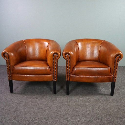 2x sheep leather club chairs