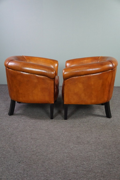 2x sheep leather club chairs