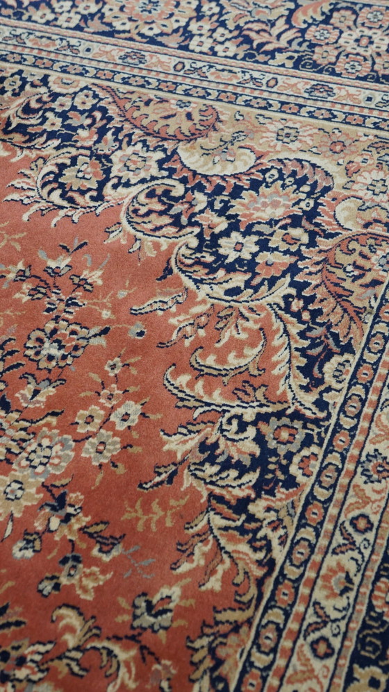 Image 1 of Old pink, red and blue oriental wool rug, 285x202cm