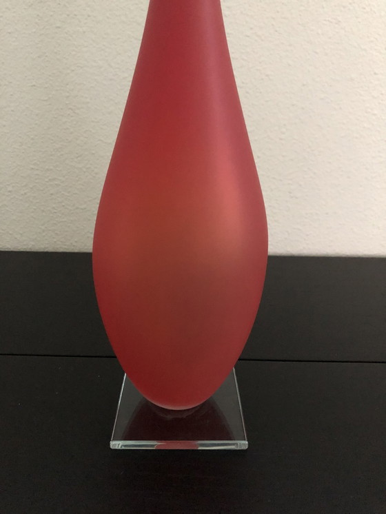 Image 1 of Longneck glass object