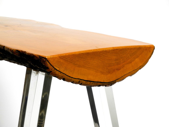 Image 1 of 1970s Regency design side coffee table made of a thick tree slice and with 3 plexiglass legs