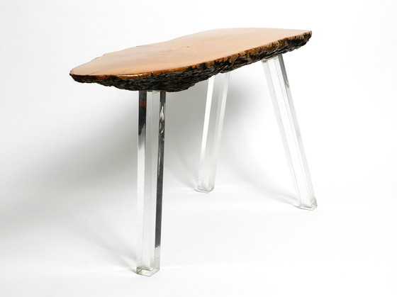 Image 1 of 1970s Regency design side coffee table made of a thick tree slice and with 3 plexiglass legs