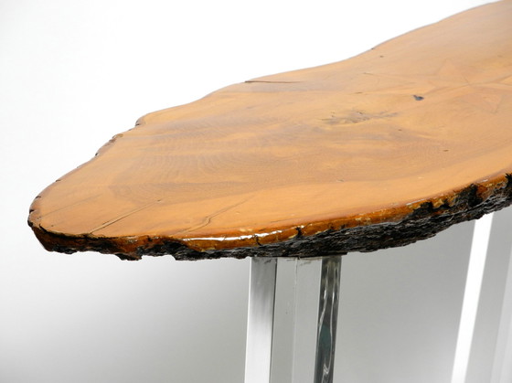 Image 1 of 1970s Regency design side coffee table made of a thick tree slice and with 3 plexiglass legs