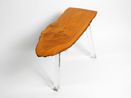 Image 1 of 1970s Regency design side coffee table made of a thick tree slice and with 3 plexiglass legs