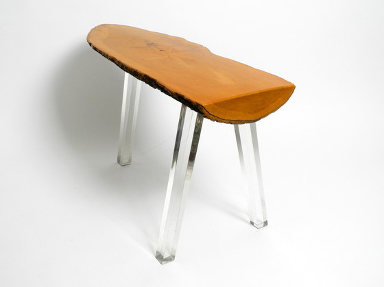 Image 1 of 1970s Regency design side coffee table made of a thick tree slice and with 3 plexiglass legs