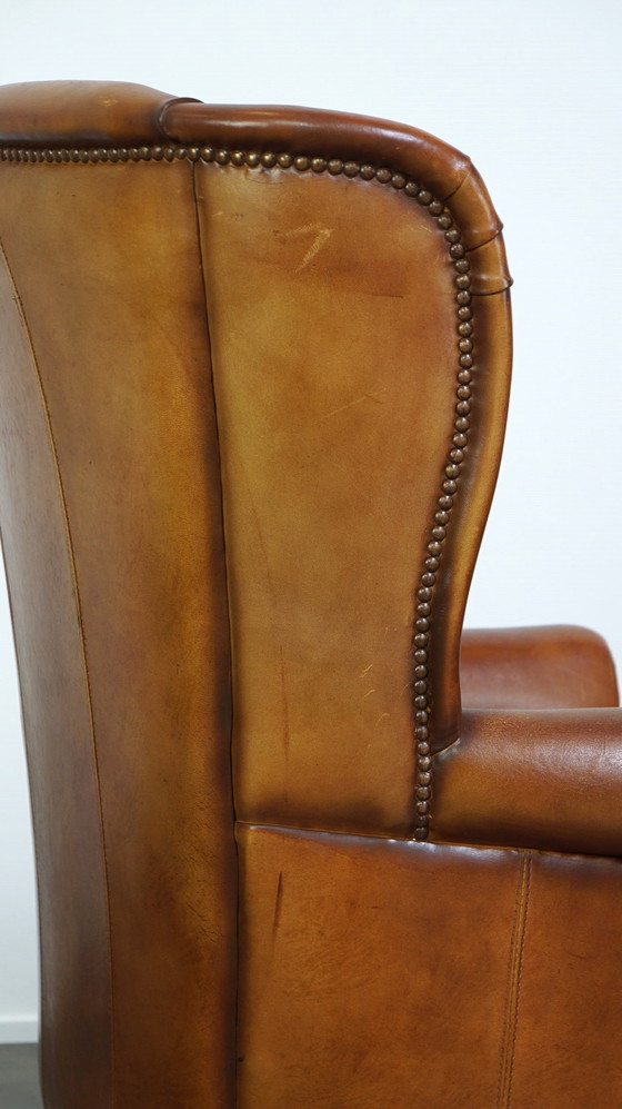 Image 1 of Fauteuil à oreilles en peau de mouton