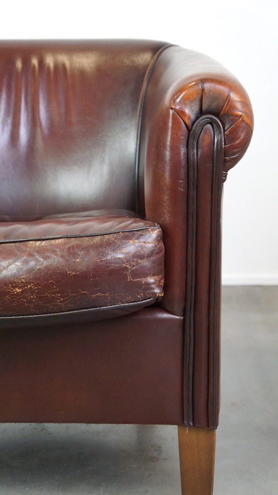 Image 1 of Sheepskin club chair with patina