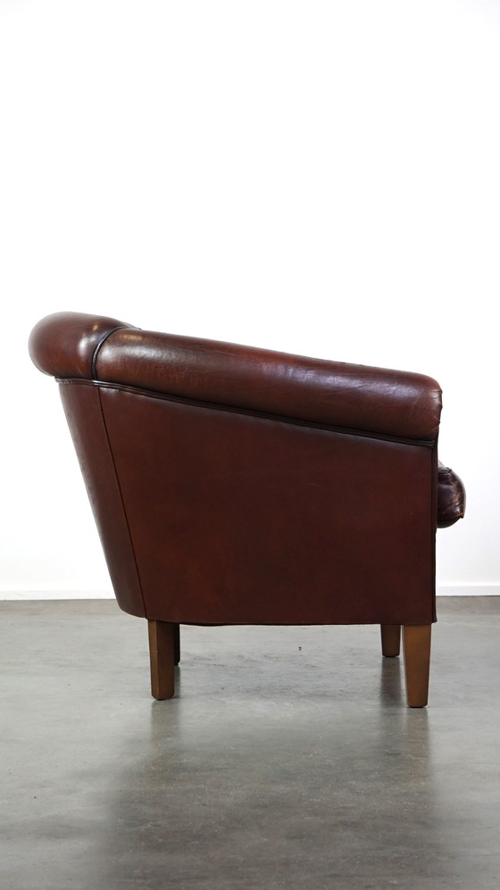 Image 1 of Sheepskin club chair with patina