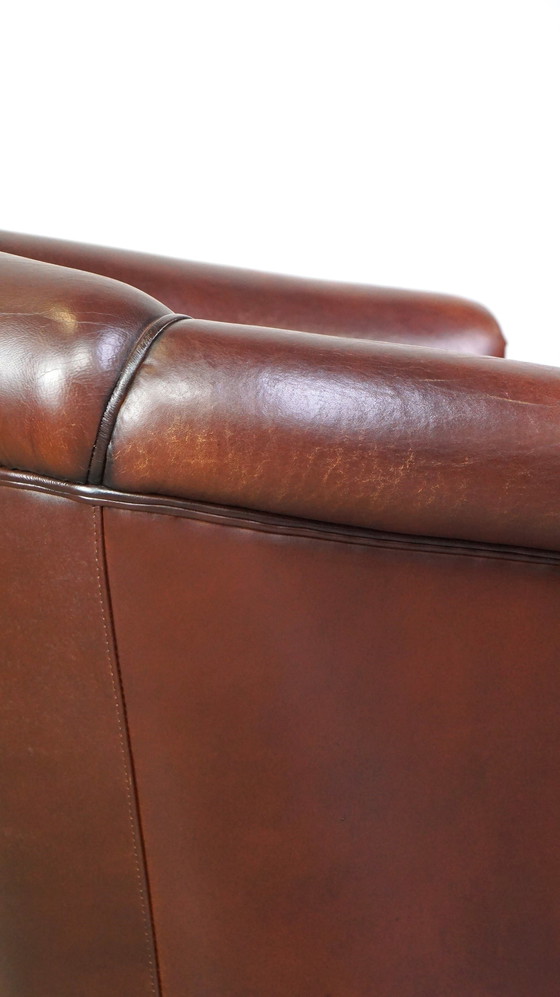 Image 1 of Sheepskin club chair with patina