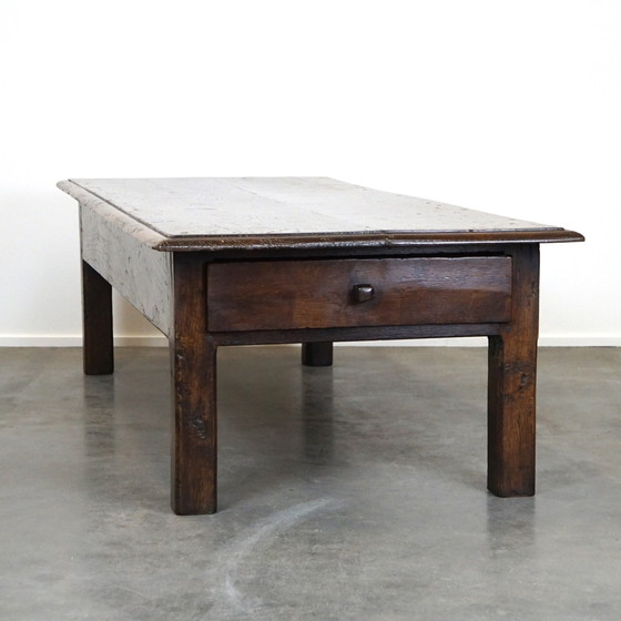 Image 1 of Large dark oak coffee table with drawer