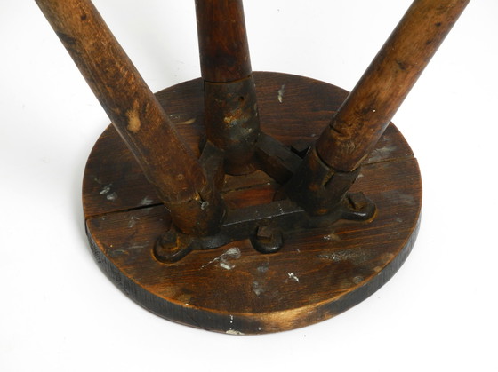 Image 1 of Solid 1930s three-legged industrial stool made of oak