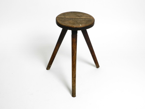 Image 1 of Solid 1930s three-legged industrial stool made of oak