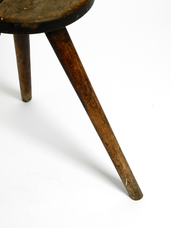 Image 1 of Solid 1930s three-legged industrial stool made of oak