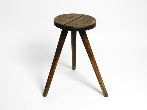 Image 1 of Solid 1930s three-legged industrial stool made of oak