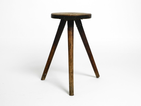 Image 1 of Solid 1930s three-legged industrial stool made of oak