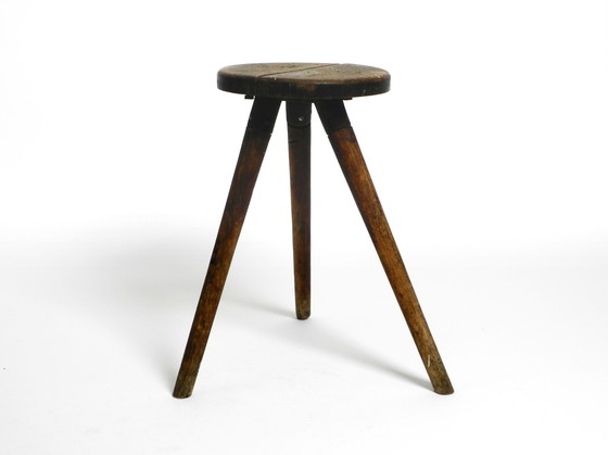 Image 1 of Solid 1930s three-legged industrial stool made of oak