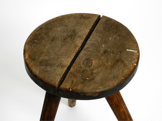 Image 1 of Solid 1930s three-legged industrial stool made of oak