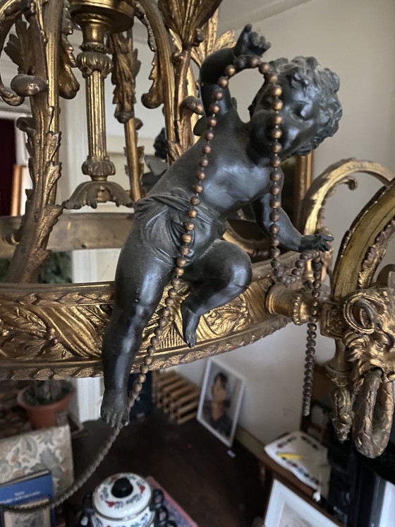 Image 1 of Antique Chandelier With Gorgeous Ornaments And Black Cherubs