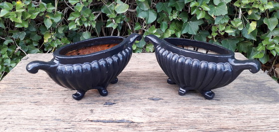 Image 1 of 2 Cast iron vases 27 cm wide