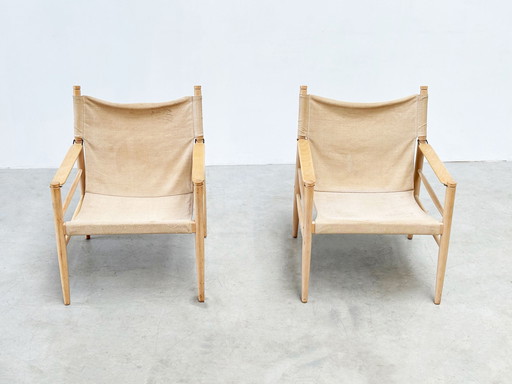 Set of two oak and linnen safari chairs