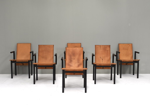 Ensemble unique de six chaises de salle à manger en cuir cognac, circa 1970-80