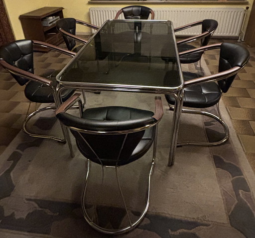 Iron Frame With Smoke Glass And Six Chairs