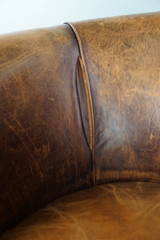 Image 1 of Sheep leather club armchair with signs of wear