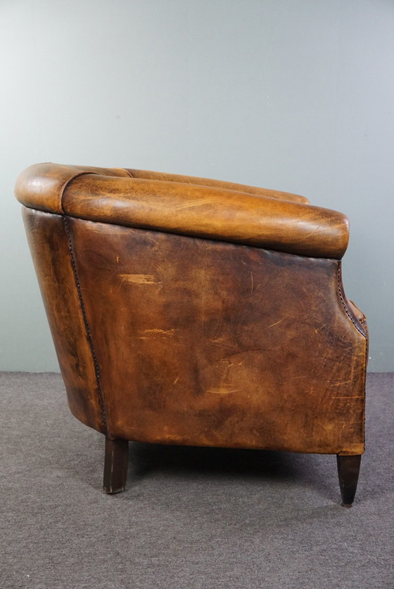 Image 1 of Sheep leather club armchair with signs of wear