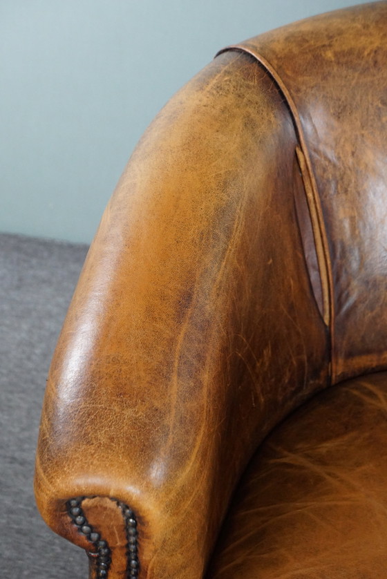 Image 1 of Sheep leather club armchair with signs of wear