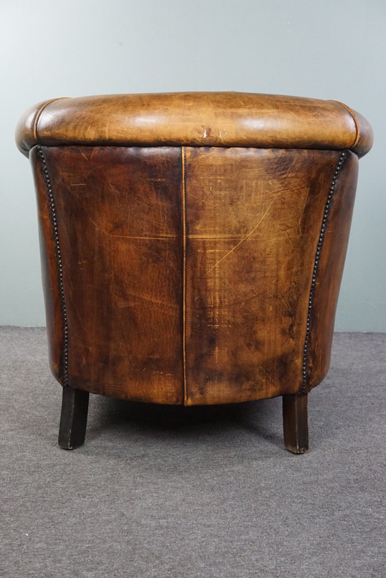 Image 1 of Sheep leather club armchair with signs of wear