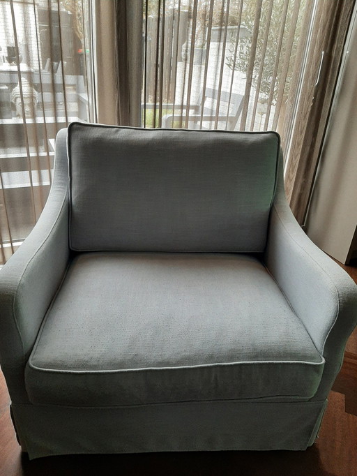 Light Blue Lounge Chair In Good Condition.