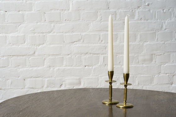 Image 1 of 2x Mid century brass candle sticks, Kara Denmark