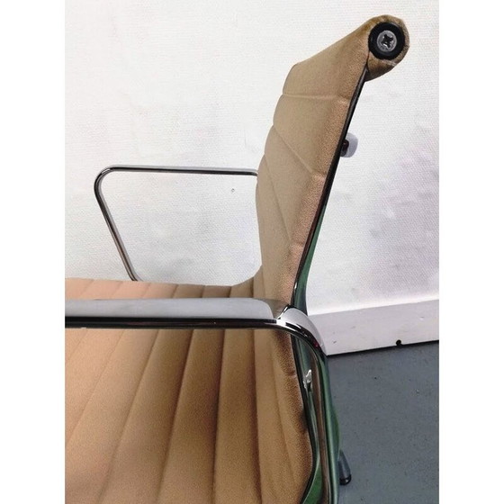 Image 1 of Vintage EA107 armchair with armrests by Charles & Ray Eames for Vitra