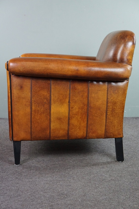 Image 1 of Sheep leather ArtDeco designer armchair with accents all around