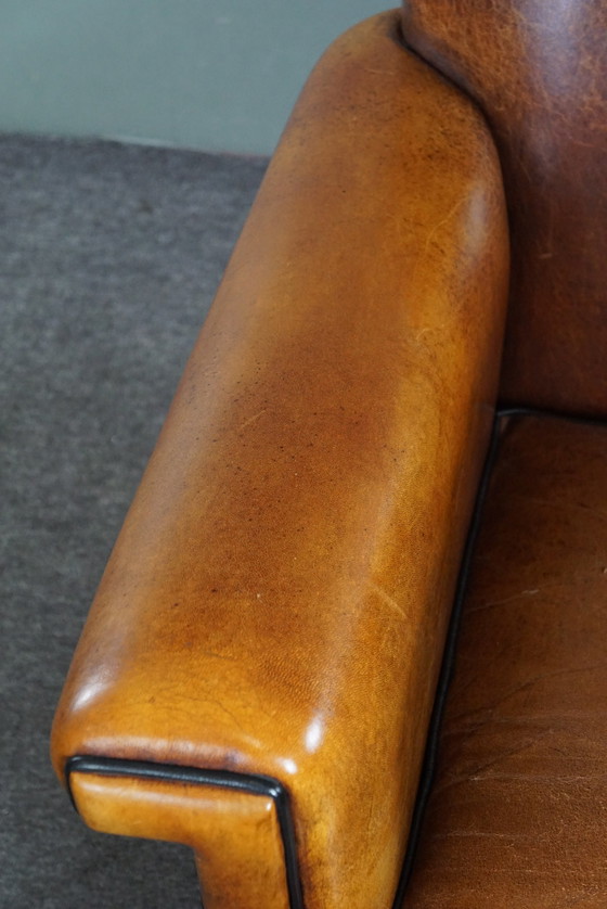 Image 1 of Sheep leather ArtDeco designer armchair with accents all around