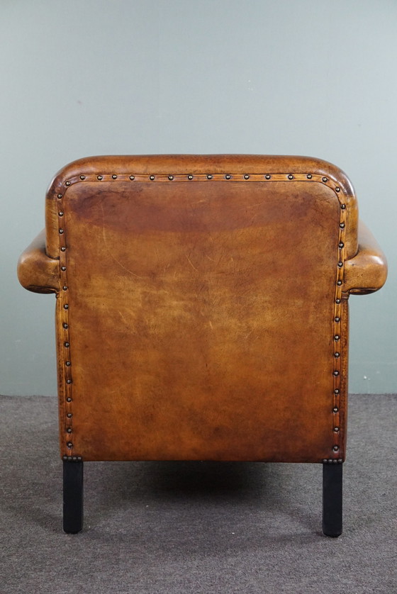 Image 1 of Sheep leather ArtDeco designer armchair with accents all around