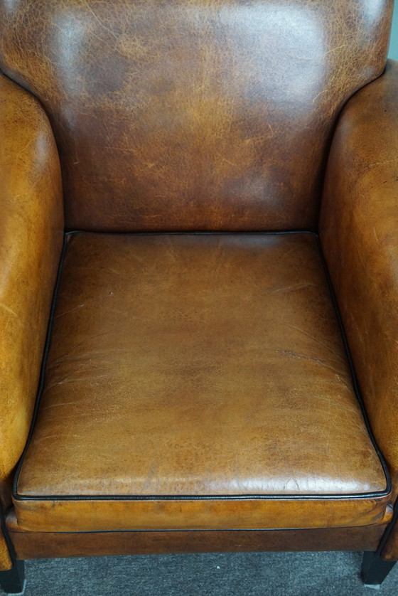 Image 1 of Sheep leather ArtDeco designer armchair with accents all around