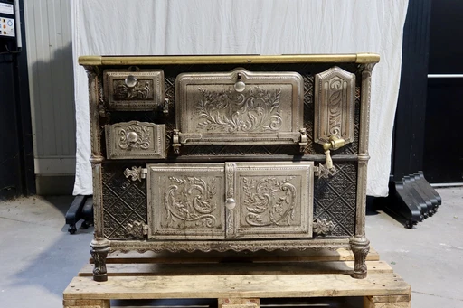 Antique cast-iron gas stove with glazed plates