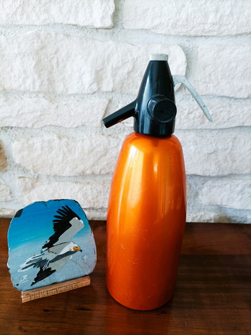 Orange antique siphon