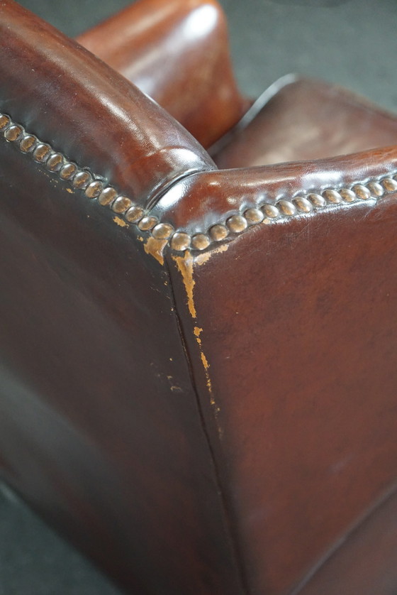 Image 1 of Warm brown sheepskin leather wing chair