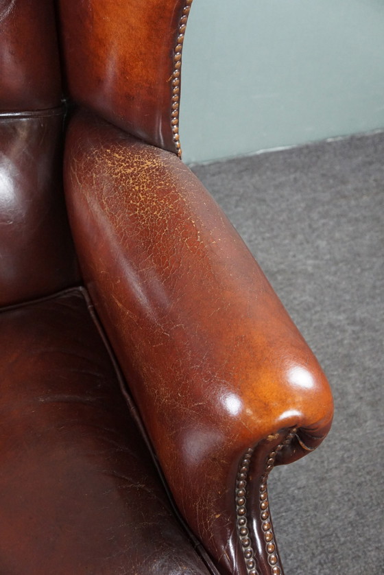 Image 1 of Warm brown sheepskin leather wing chair