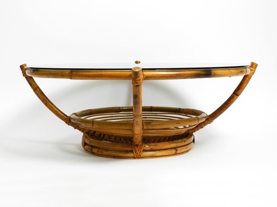 Image 1 of Beautiful 1970s large Italian coffee table made of bamboo and original smoked glass top |  Ø 102 cm | 40.2"