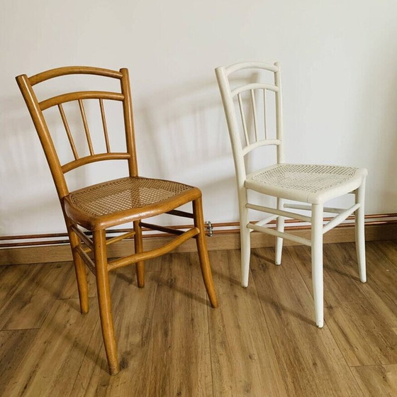 Image 1 of Pair of mismatched vintage caned chairs