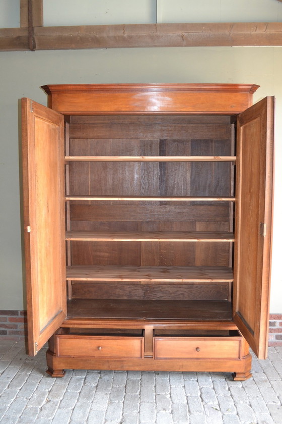 Image 1 of Large Sleek Antique Mahogany Cupboard.